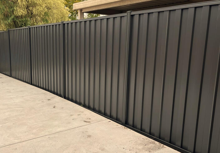 Colorbond fence in Monument colour installed in Cranbourne North
