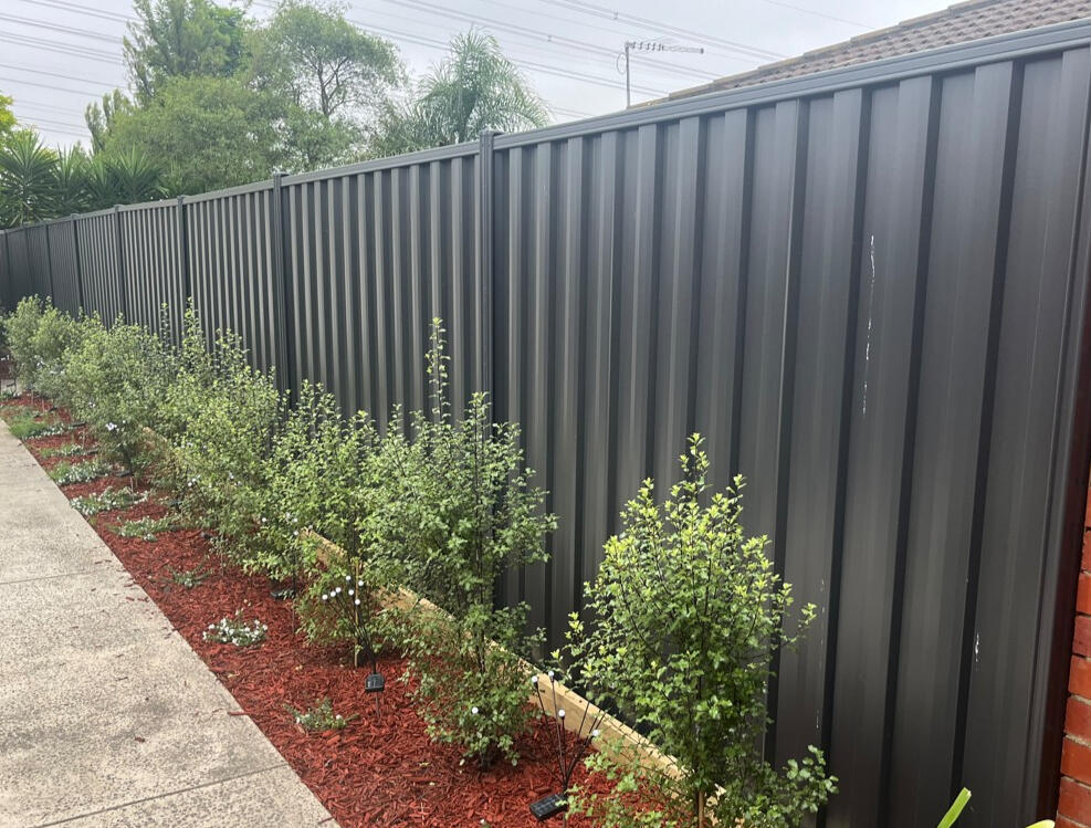2.1m high Colorbond fence in Monument colour installed in Cranbourne for privacy